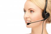 pic of helpline  - bright picture of friendly female helpline operator - JPG 