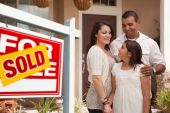 image of home  - Hispanic Mother Father and Daughter in Front of Their New Home with Sold Home For Sale Real Estate Sign - JPG 