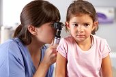 stock photo of medical doctors  - Doctor Examining Child - JPG 