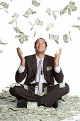 stock photo of money  - Young African American professional man in money - JPG 