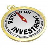 picture of investment  - A gold compass with red needle pointing to words Return on Investment to illustrate ROI - JPG 