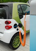 picture of future technology  - Charging of electric car on service station - JPG 