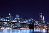 stock photo of bridge  - Brooklyn Bridge and Manhattan Skyline At Night - JPG 