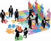 pic of puzzle  - Business people collaborate to put pieces together find solution to puzzle and build startup - JPG 