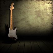 image of interior  - grunge interior with electric guitar and lighting effects - JPG 