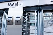 image of security  - This is closeup of security turnstile on stadium - JPG 