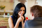 pic of meeting  - marriage proposal, man give ring to his girl, young happy couple romantic date at restaurant, celebrating valentine day
** Note: Shallow depth of field - JPG 