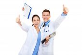 picture of medical doctors  - excited medical team doctor man and woman happy smile - JPG 