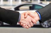 image of handshake  - Business handshake to close the deal after buying a car - JPG 