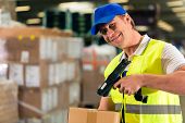 pic of scan  - Warehouseman with protective vest and scanner - JPG 