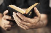 pic of religion  - Dirty hands holding an old bible. Very short depth-of-field
** Note: Shallow depth of field - JPG 