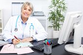foto of medical doctors  - Medical doctor woman in the office - JPG 