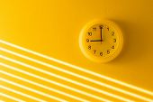 stock photo of clockface  - Yellow wall  - JPG 