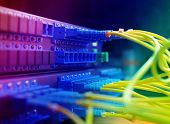 picture of internet technology  - shot of network cables and servers in a technology data center - JPG 