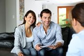 stock photo of meeting  - Couple meeting consultant for financial contract - JPG 
