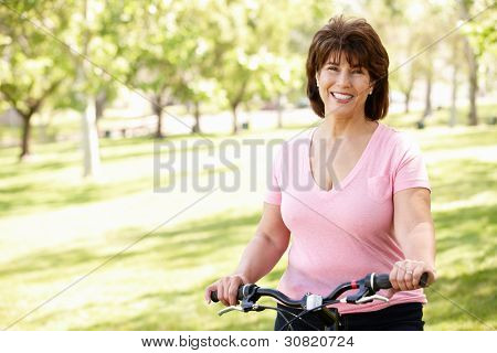 Picture or Photo of Senior Hispanic woman with bike