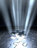 pic of puzzle  - conceptual 3d art showing the last jigsaw puzzle piece coming down into it - JPG 