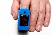 image of pulse  - A pulse oximeter used to measure pulse rate and oxygen levels - JPG 