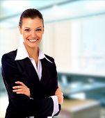 stock photo of woman  - Positive business woman smiling over white background - JPG 