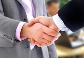 stock photo of handshake  - handshake isolated in office - JPG 