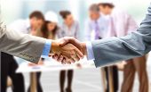 picture of handshake  - handshake isolated on business background - JPG 