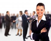 stock photo of business  - Female Business leader standing in front of her team - JPG 