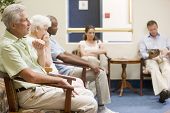 stock photo of wait  - Five people waiting in waiting room - JPG 