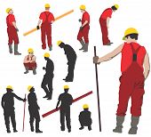 picture of construction worker  - Team of Construction workers in red workwear an yellow helmets - JPG 