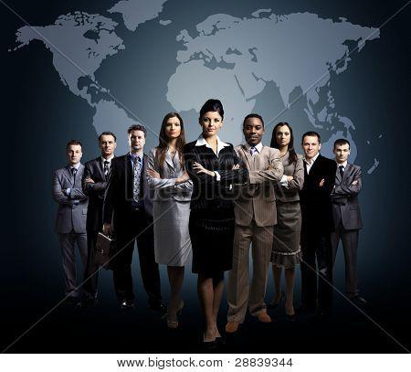 Picture or Photo of Business people team with world map
