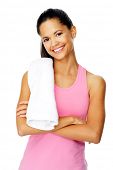 stock photo of woman  - healthy fit woman with gym towel stands with confidence and smiles isolated on white - JPG 