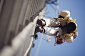 picture of tower  - Climber ascending 300 - JPG 