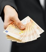picture of money  - picture of man in suit with euro cash money - JPG 