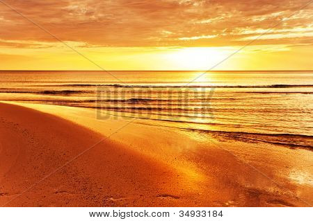 Picture or Photo of Tropical beach at beautiful sunset. Nature background