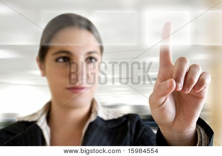 Picture or Photo of Business woman touch digital interface (Business and technology concept)
