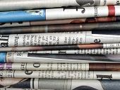 image of newspaper  - Detail of a pile of international newspapers - JPG 