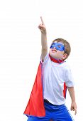 picture of boy  - A young boy is dressed up as a superhero and pointing up with a mask and cape - JPG 