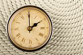 picture of tick tock  - Clock with Roman numerals on cord background - JPG 