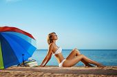 picture of beach  - Image of luxury girl lies on the beach - JPG 