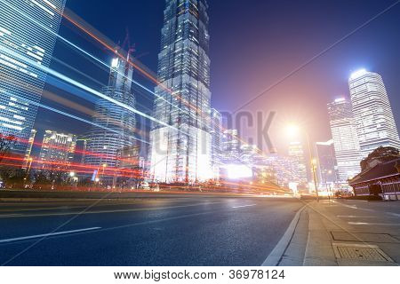 Picture or Photo of The light trails on the modern building background in shanghai china