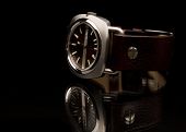 picture of watch  - Modern watch on black background isolated photo detail - JPG 