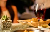 image of restaurant  - The served table with red wine at restaurant  - JPG 
